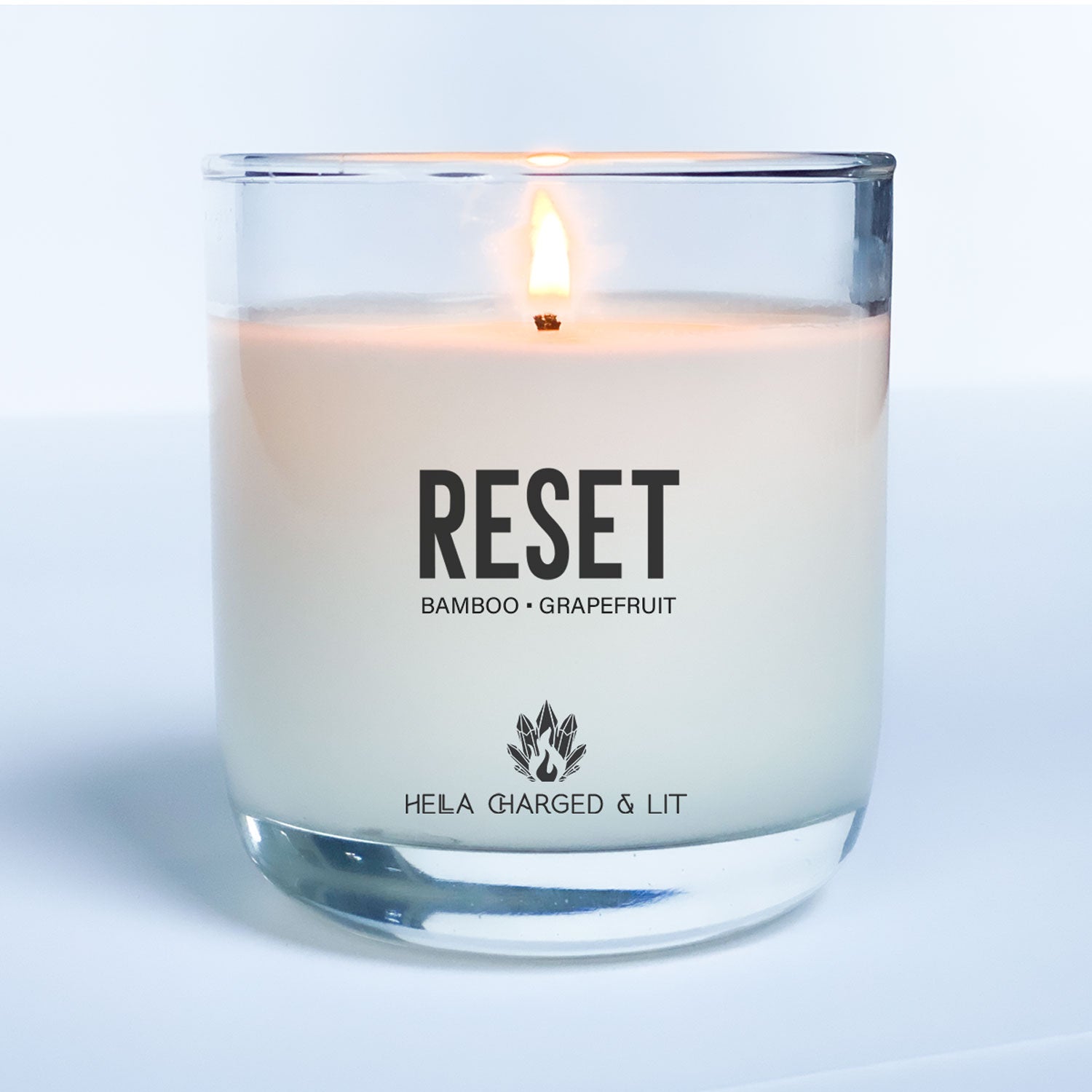 Reset - Hella Charged & LIT | Ethically Made Sustainable Vegan Candles, Jewelry & More